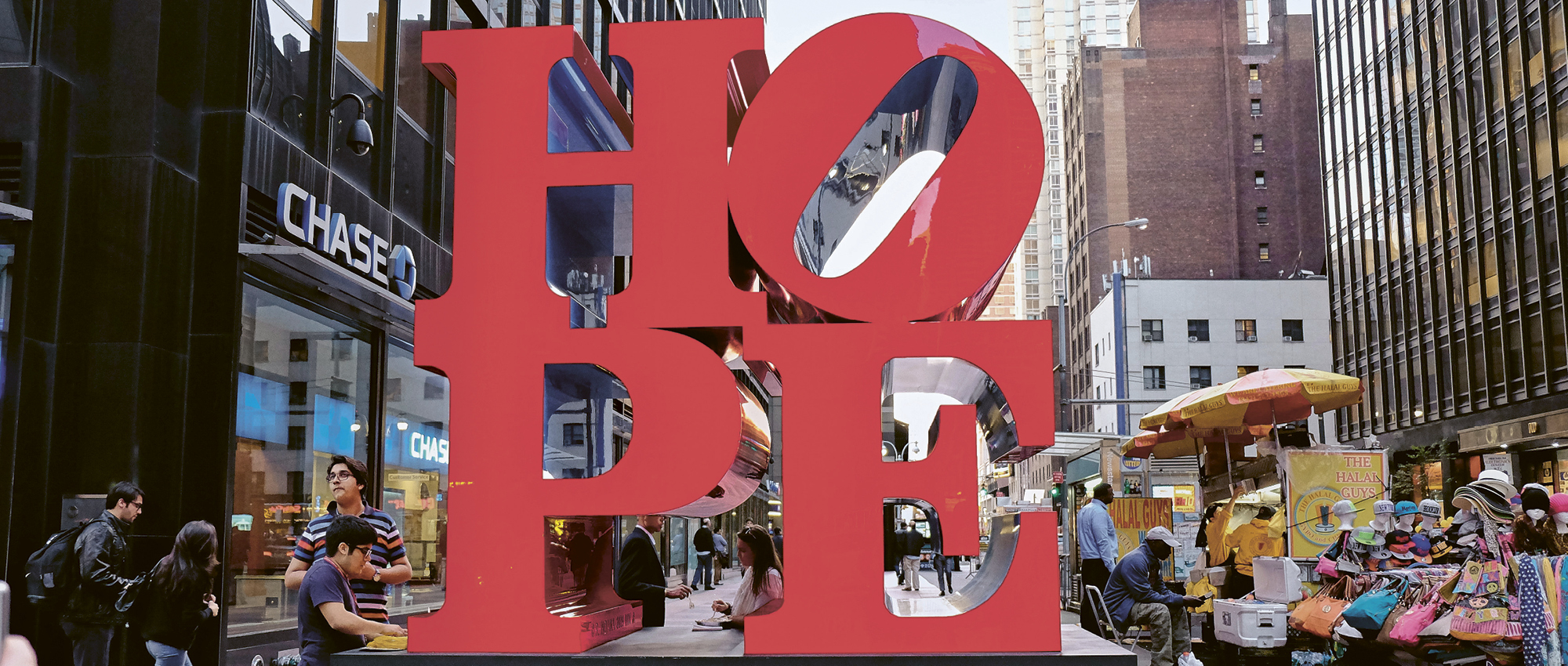 A red installation of the word