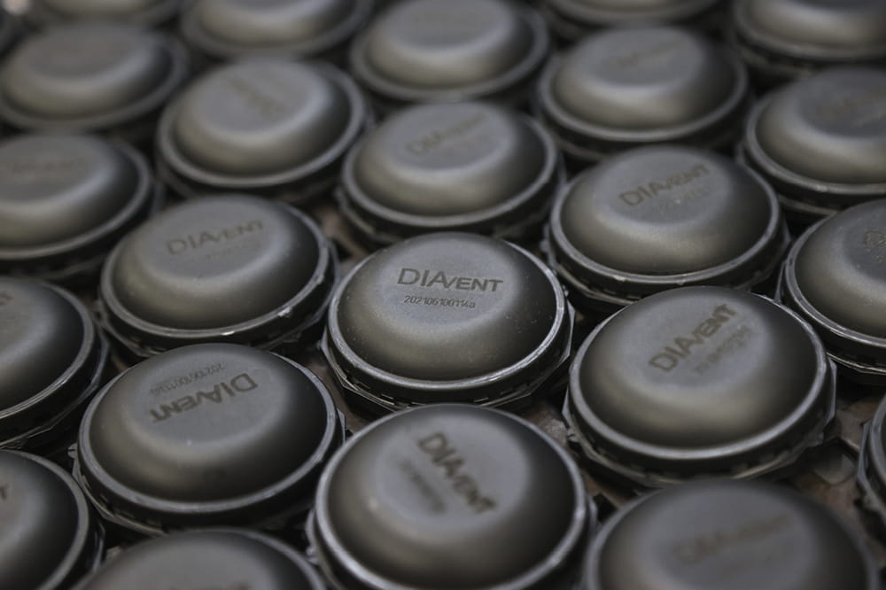 Image-filling close-up of several DIAvent plastic parts