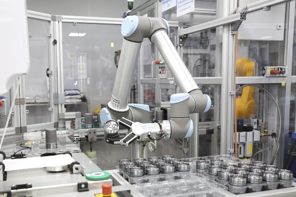 A robotic arm in a factory.