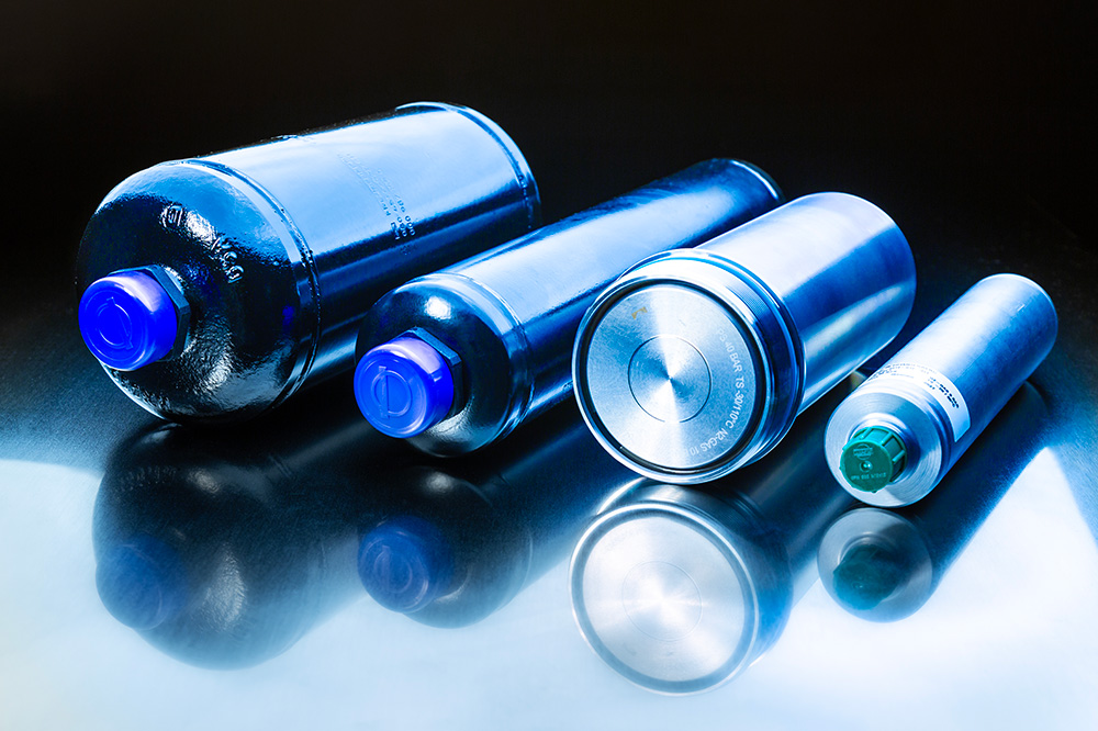 Piston hydraulic accumulators for automotive and agricultural applications